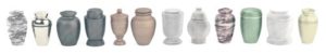 Line-of-various-cremation-urns-on-white-background